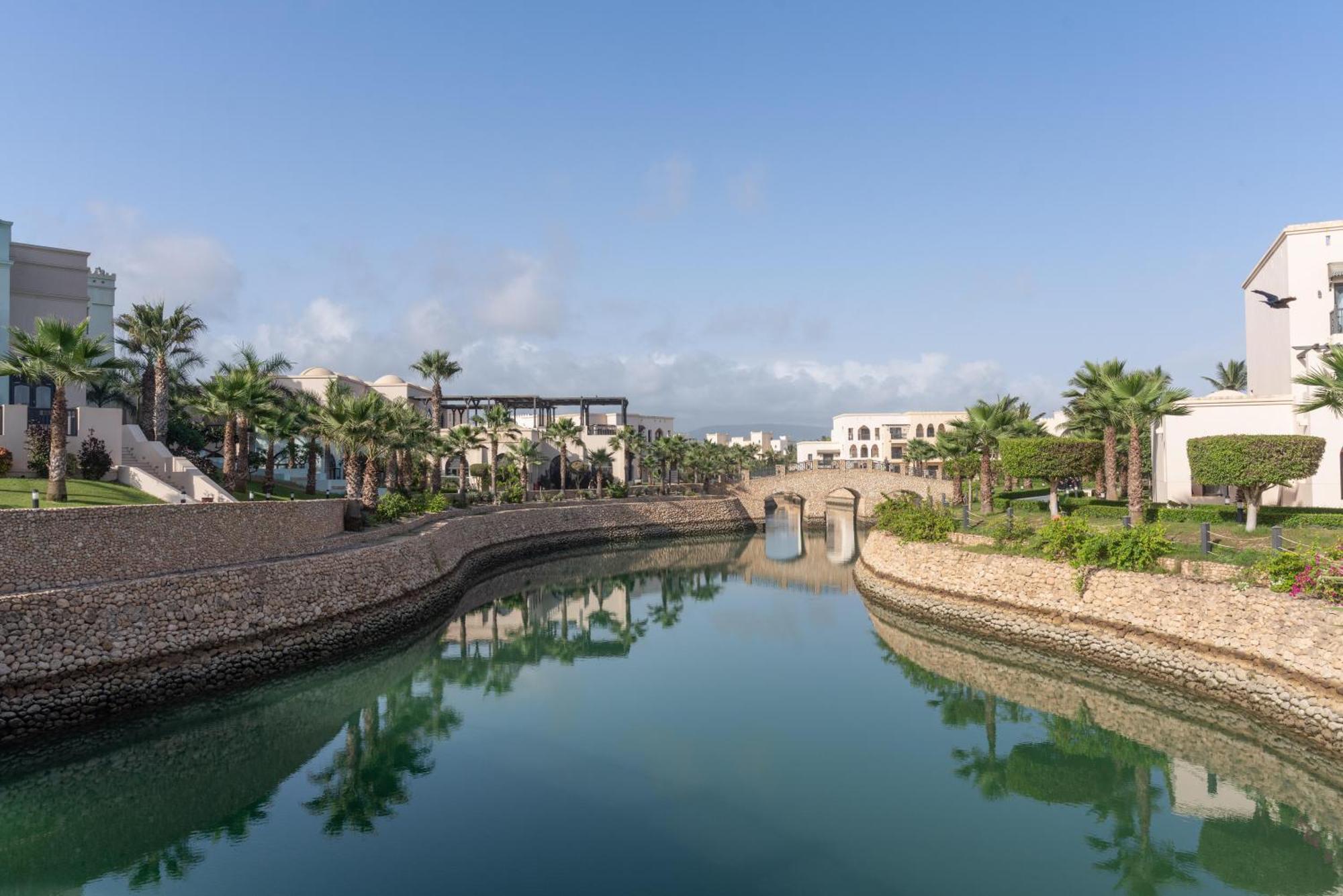 Salalah Rotana Resort Exterior foto Residential canal in Al Reef